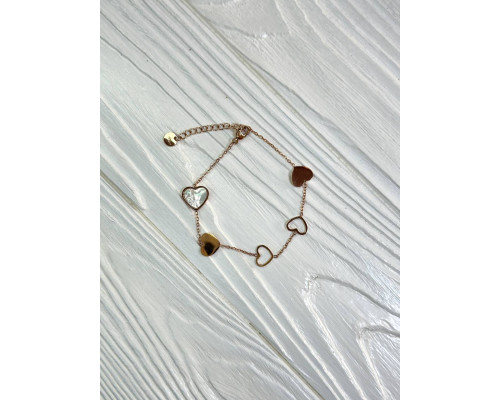 Жіночий регульований браслет медична сталь декор  сердечка колір золотистий