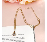 Жіночий ланцюжок на шию золотистого кольору з кристалом Swarovski