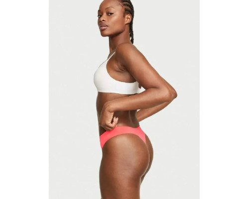 Жіночі трусики безшовні Victoria's Secret Seamless Thong стрінги помаранчеві М