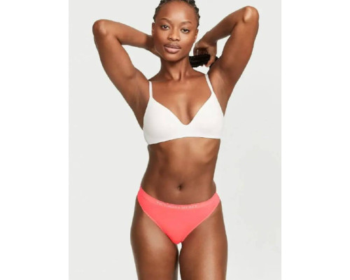 Жіночі трусики безшовні Victoria's Secret Seamless Thong стрінги помаранчеві М